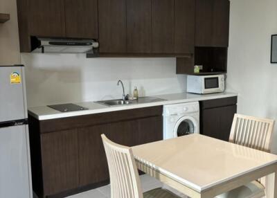 Modern kitchen with dining table