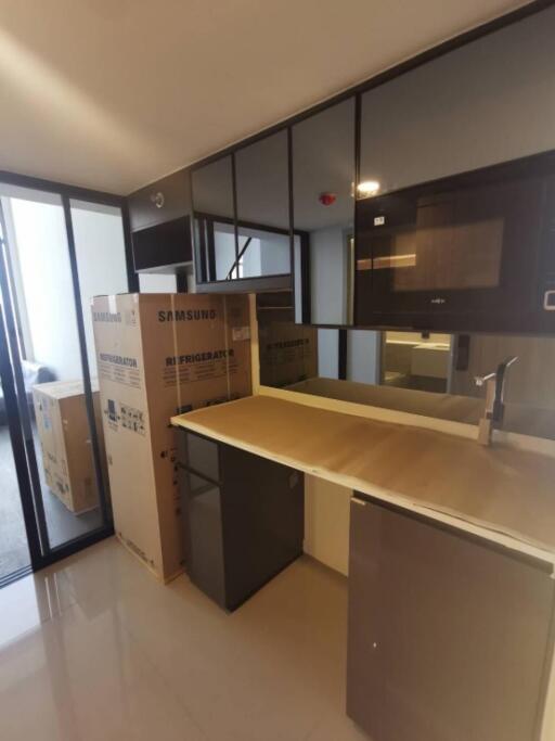 Modern kitchen area with Samsung refrigerator