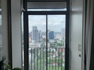 View from a building window overlooking a city skyline