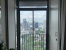 View from a building window overlooking a city skyline