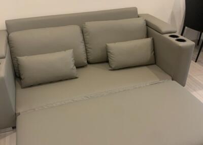 Modern living room with a grey sectional sofa
