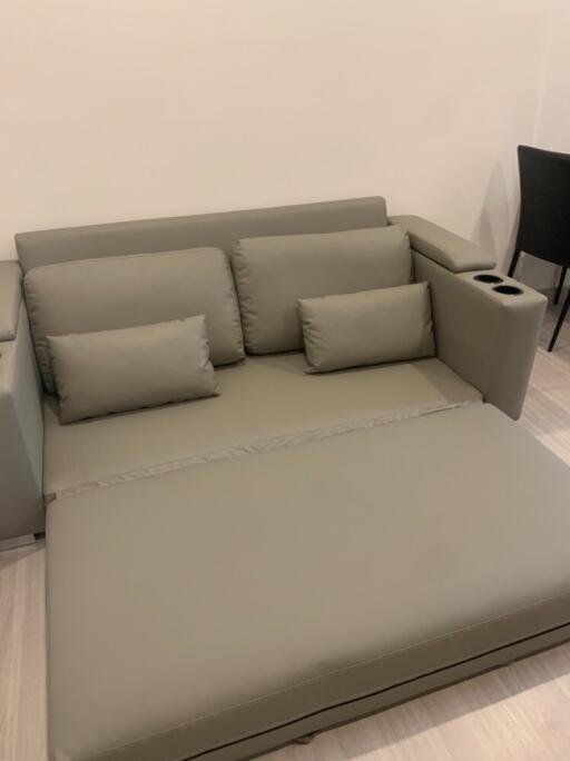 Modern living room with a grey sectional sofa