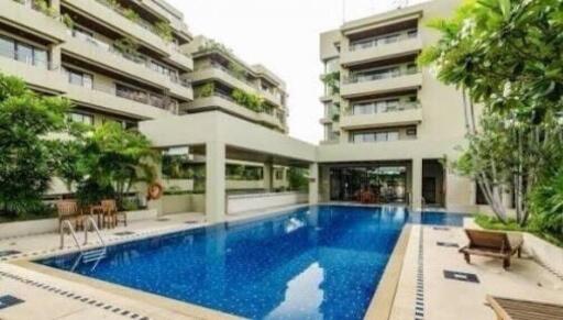 Outdoor pool area in a residential complex