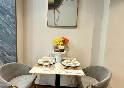 Small dining area with a table for two