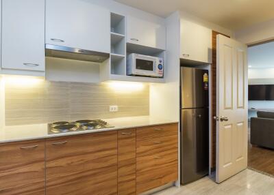 Modern kitchen with appliances and wooden cabinets