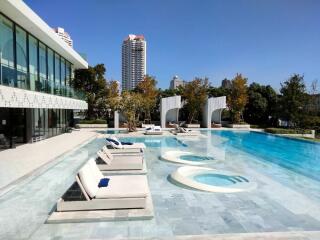 Luxurious outdoor pool area with lounge chairs and modern design