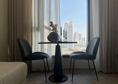 A cozy dining area with a city view