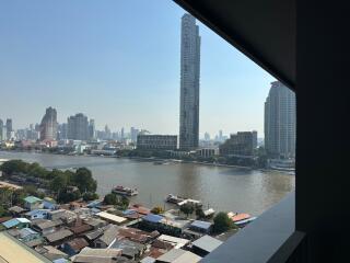 View of river and city skyline from balcony