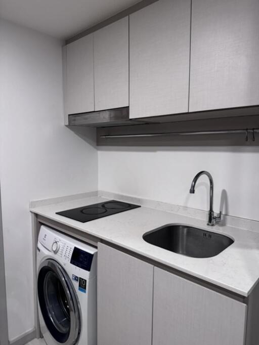 Modern kitchen with washing machine