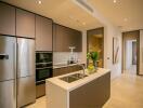 Modern kitchen with island and stainless steel appliances