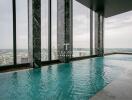 Indoor infinity pool with city view