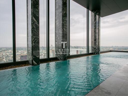 Indoor infinity pool with city view