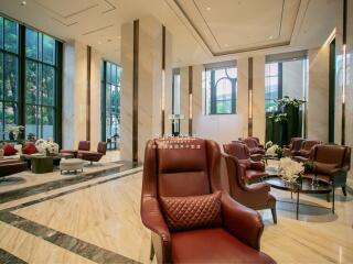 Luxurious lobby with contemporary seating and large windows