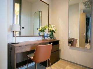 Modern bedroom with a vanity area