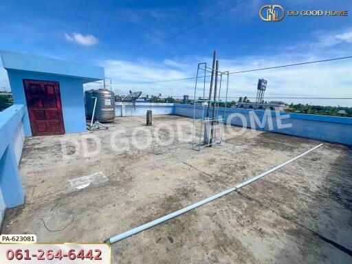 Open rooftop area with a clear sky view