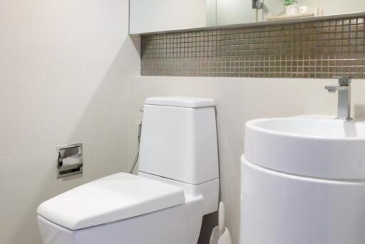 Modern bathroom with toilet and sink