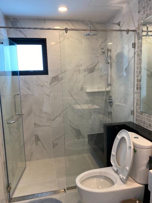 Modern bathroom with glass shower enclosure