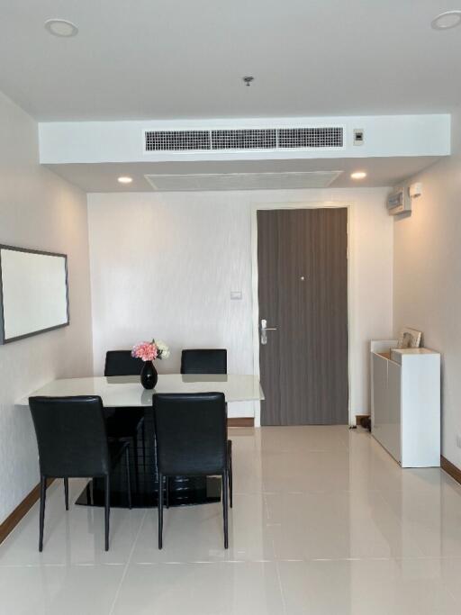 Modern dining area with table, chairs, and decor