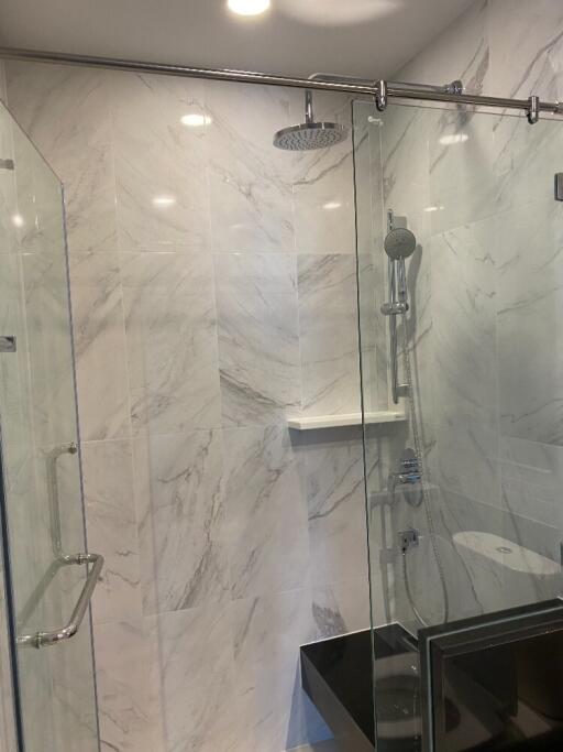 Modern bathroom with glass shower enclosure