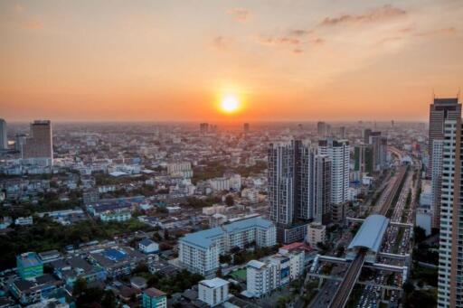 Aerial view of a city at sunset