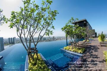 Infinity pool with city skyline view