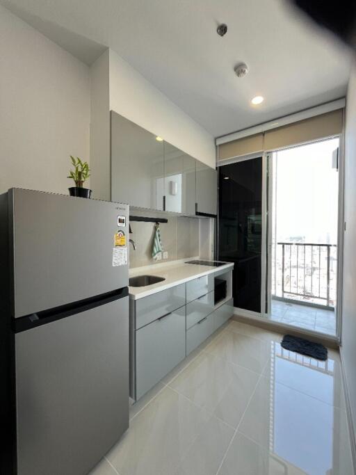 Modern kitchen with balcony view