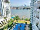 High-rise buildings with a swimming pool and river view