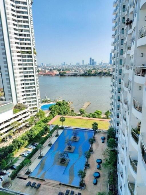 High-rise buildings with a swimming pool and river view