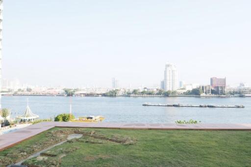 View of waterfront with cityscape in the background