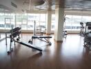 Spacious gym area with various exercise equipment