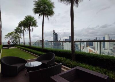 Outdoor seating area with city view