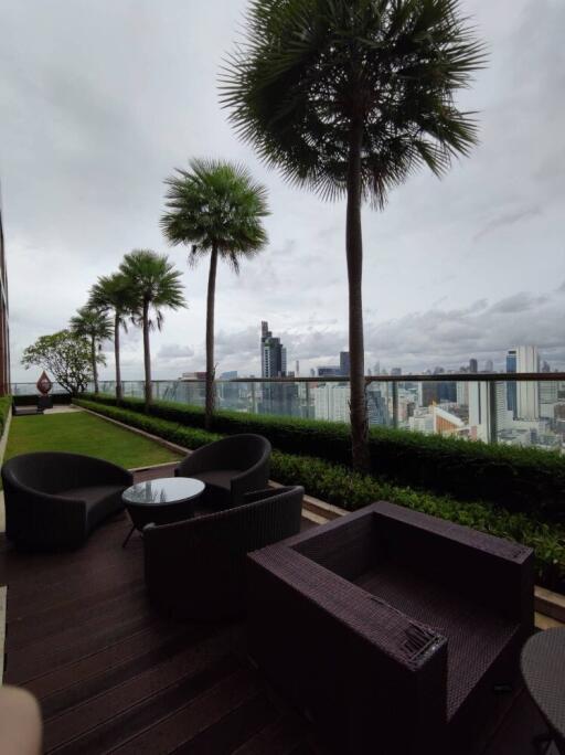 Outdoor seating area with city view