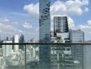 View of city skyline with tall buildings from a rooftop