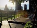 City skyline view from outdoor space with greenery