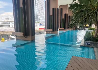 Outdoor swimming pool with city view