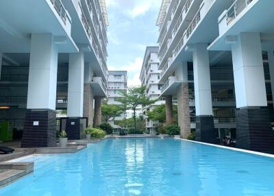 Modern apartment complex with swimming pool