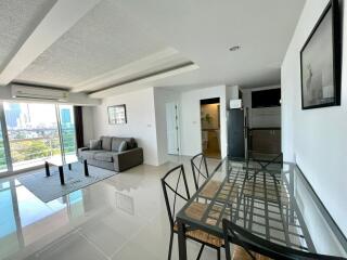 Modern living and dining area with balcony