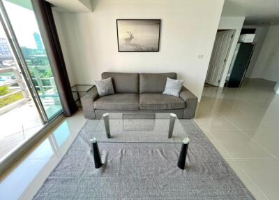 Modern living room with sofa and glass coffee table