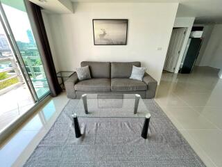 Modern living room with sofa and glass coffee table