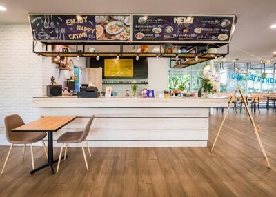 Cozy cafe with menu board and neatly arranged tables