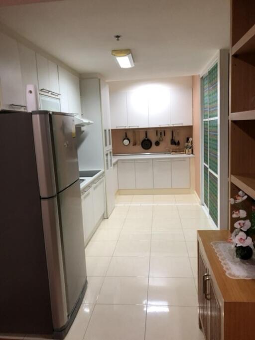 Modern kitchen with stainless steel appliances and ample cabinetry