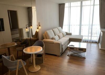 Modern living room with sofa and dining table