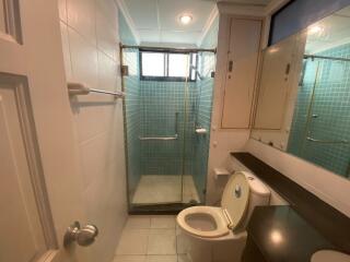 Modern bathroom with a glass-enclosed shower