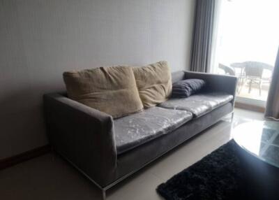 Living room with gray sofa and pillows