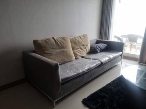 Living room with gray sofa and pillows