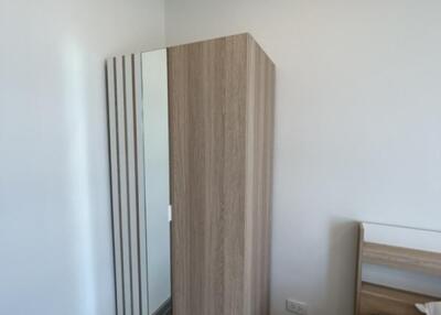 Bedroom with wardrobe and bed