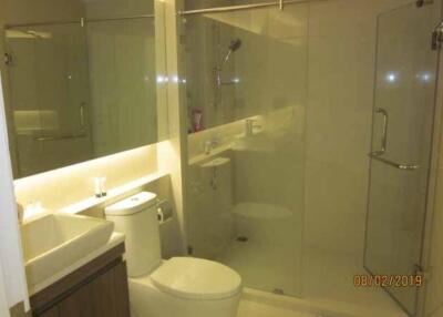 Modern bathroom with glass shower enclosure