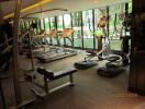 Modern gym with multiple treadmills and fitness equipment