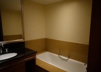 Bathroom with bathtub and sink