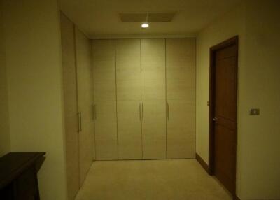 Bedroom with built-in wooden wardrobes